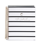 Teacher planner with black and white striped design and 'everything planned' text on a white background